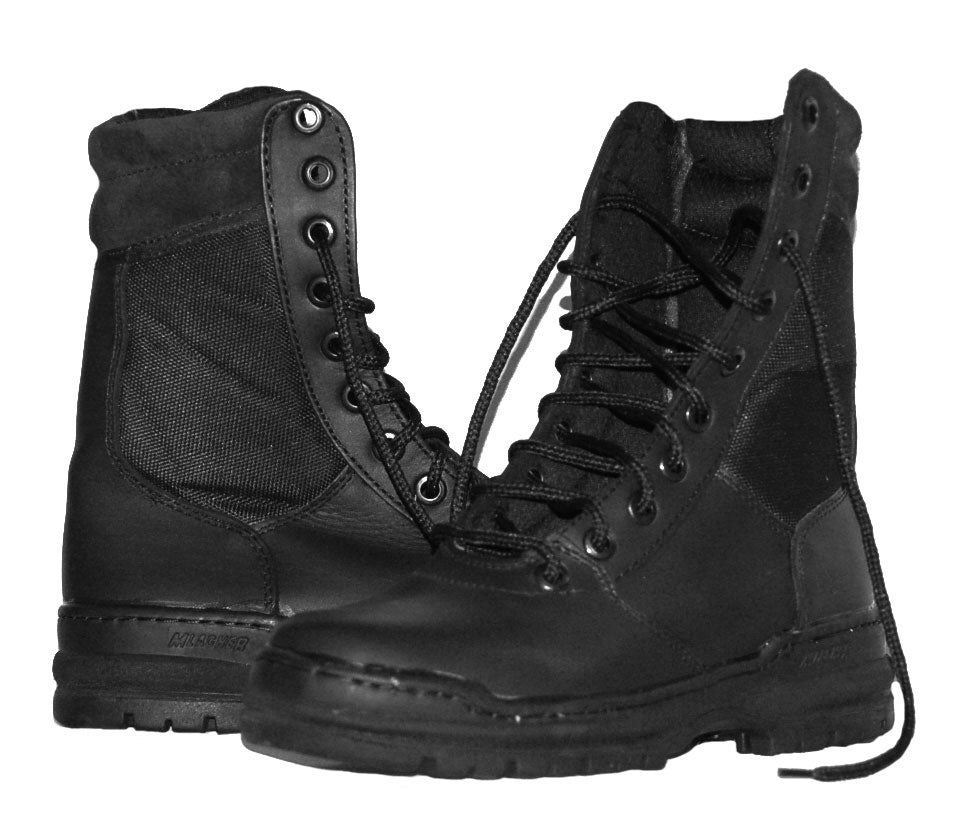 Botas tácticas negras estilo Magnum, fabricadas en piel resistente, ideales para seguridad, uso rudo y patrullaje